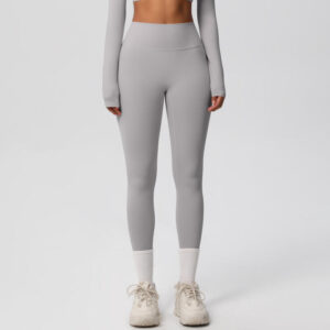 image of woman wearing leggings in grey
