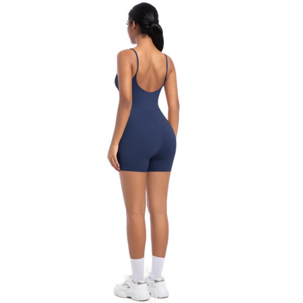image of woman wearing blue yoga bodysuit