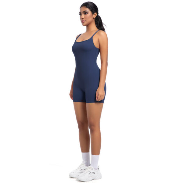 image of woman wearing blue yoga bodysuit